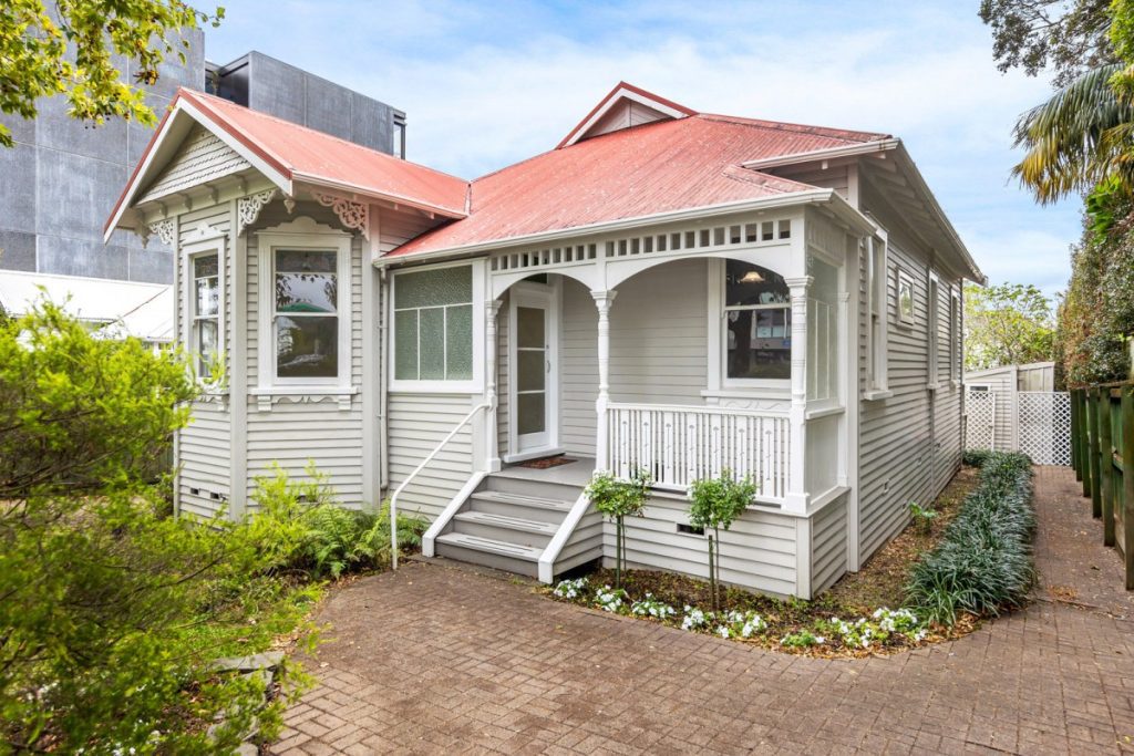 White home with iron roof