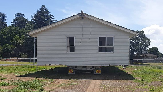 Home being transported